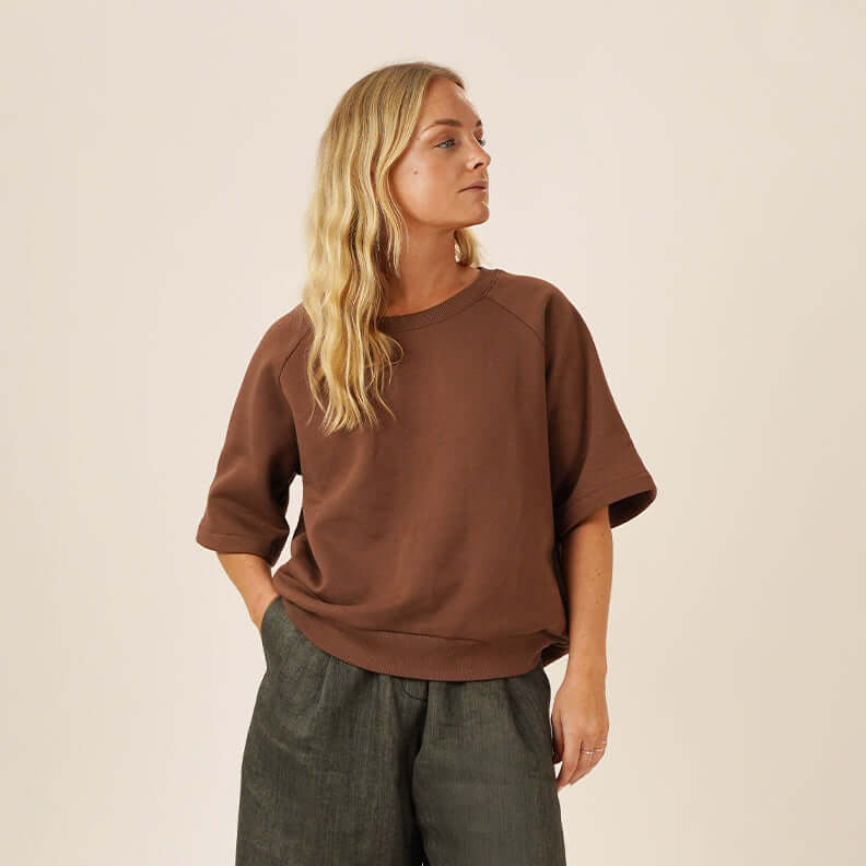 Bermuda Pants and Shorts Sewing Pattern model wearing a relaxed brown Boxy Shirt sewing pattern