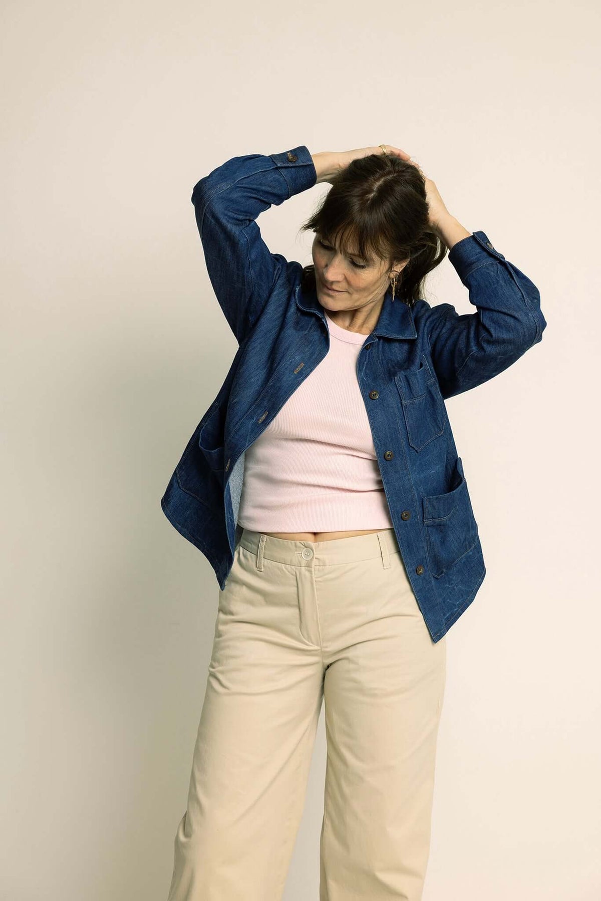 Woman wearing a Canvas Jacket Paper Pattern with a boxy fit and multiple pockets, styled casually.