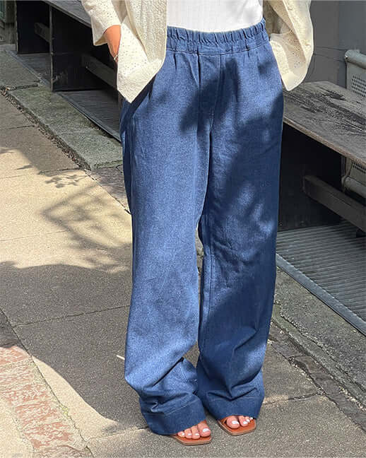 Person wearing high waist pants