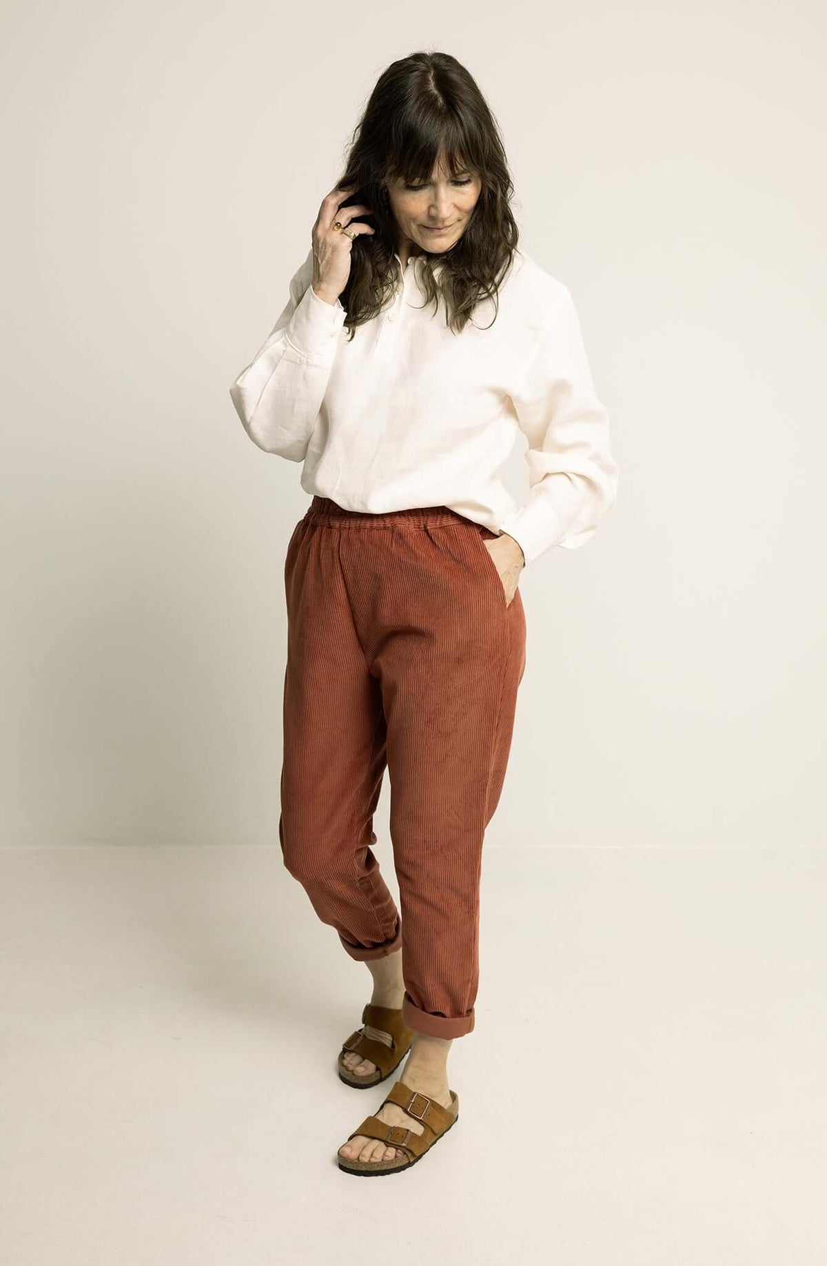 Woman wearing Easy Pants Paper Pattern in relaxed-fit, tapered-leg style with elastic waistband and stylish casual look.