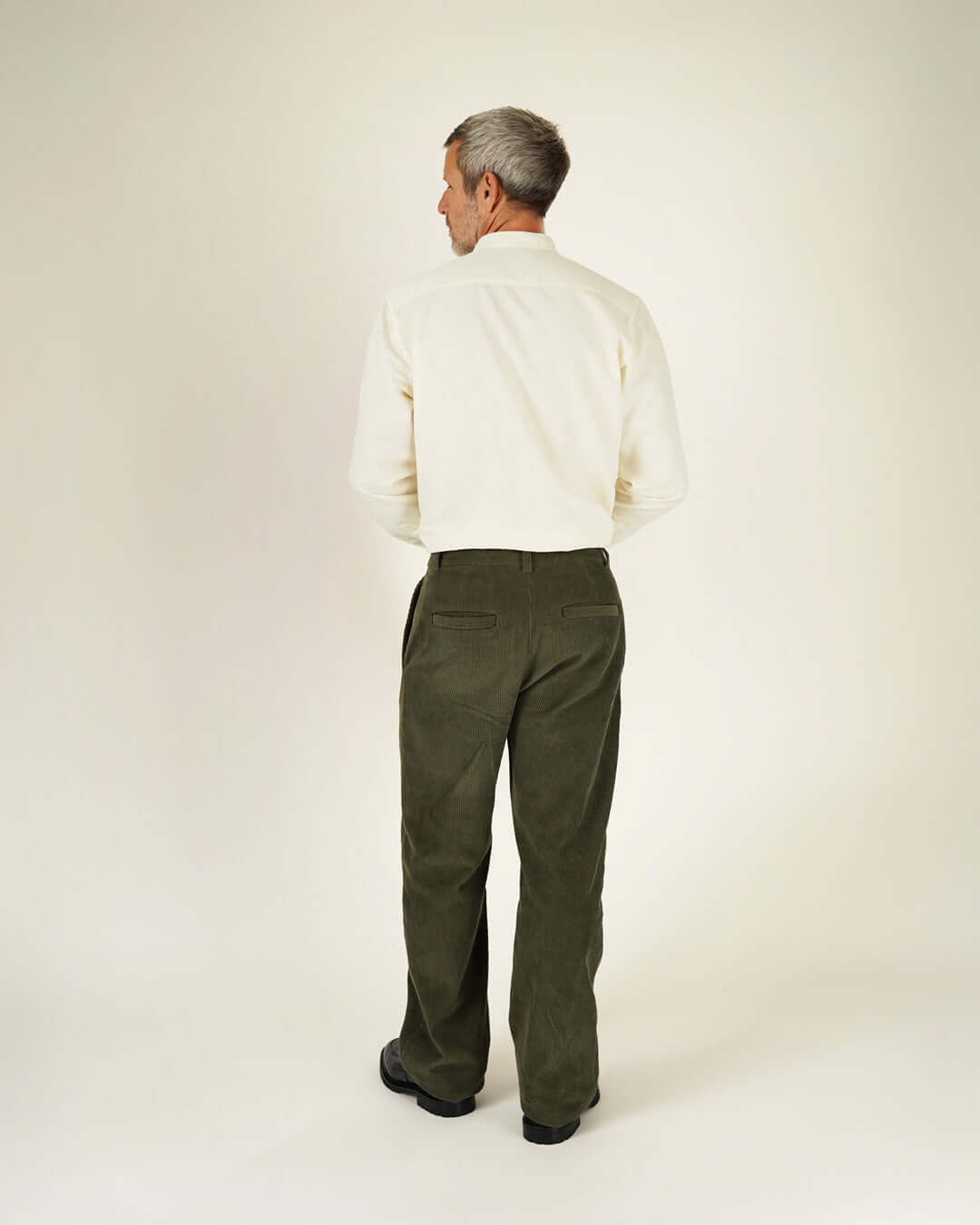 Man wearing Jensen shirt Paper Pattern, back view, displaying relaxed fit and classic collar design.