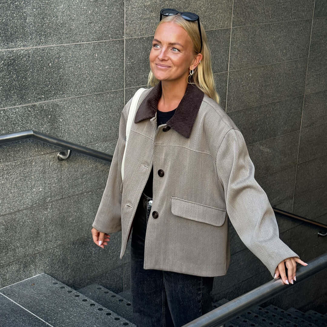 Woman wearing a stylish Car Coat Sewing Pattern, showcasing a relaxed fit and casual style, ideal for layering.