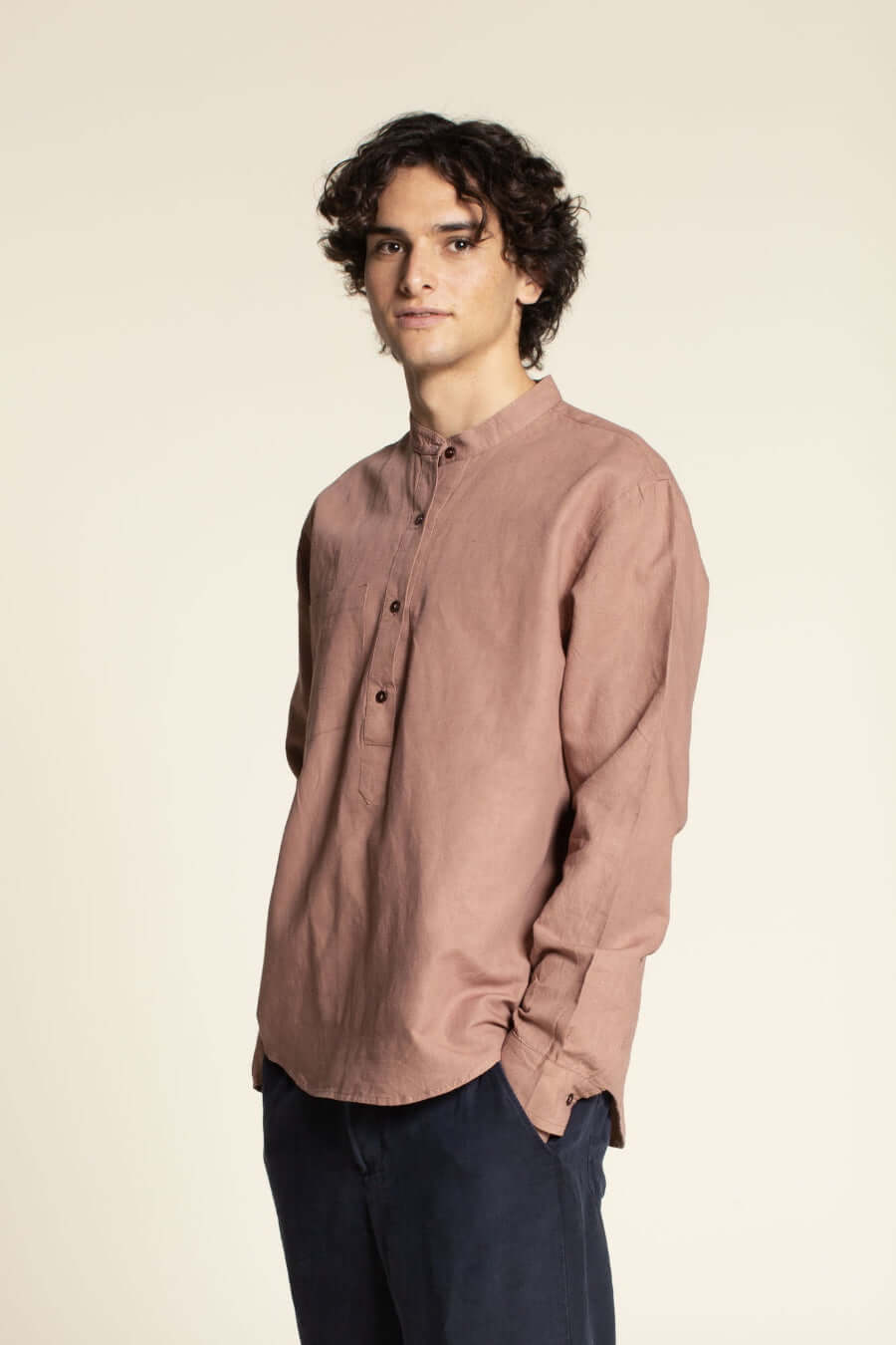 Men's Tunic paper pattern modeled by a man in a relaxed fit, featuring a banded collar and button placket.