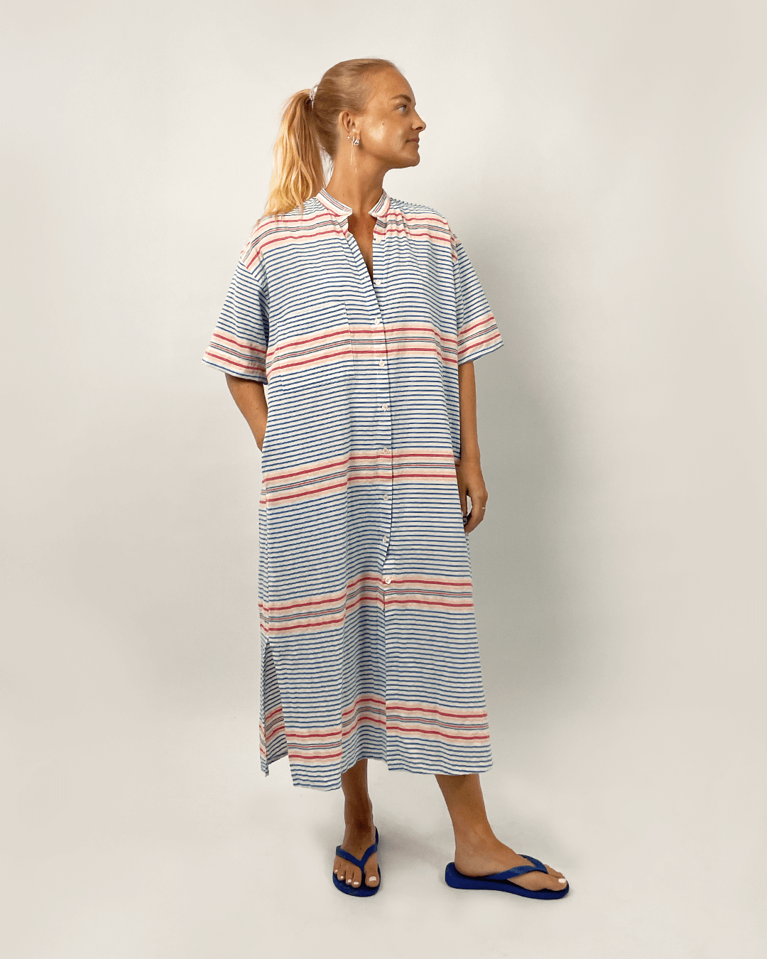 Model showcasing the Big Shirt Paper Pattern in a striped, oversized design perfect for women's sizes.