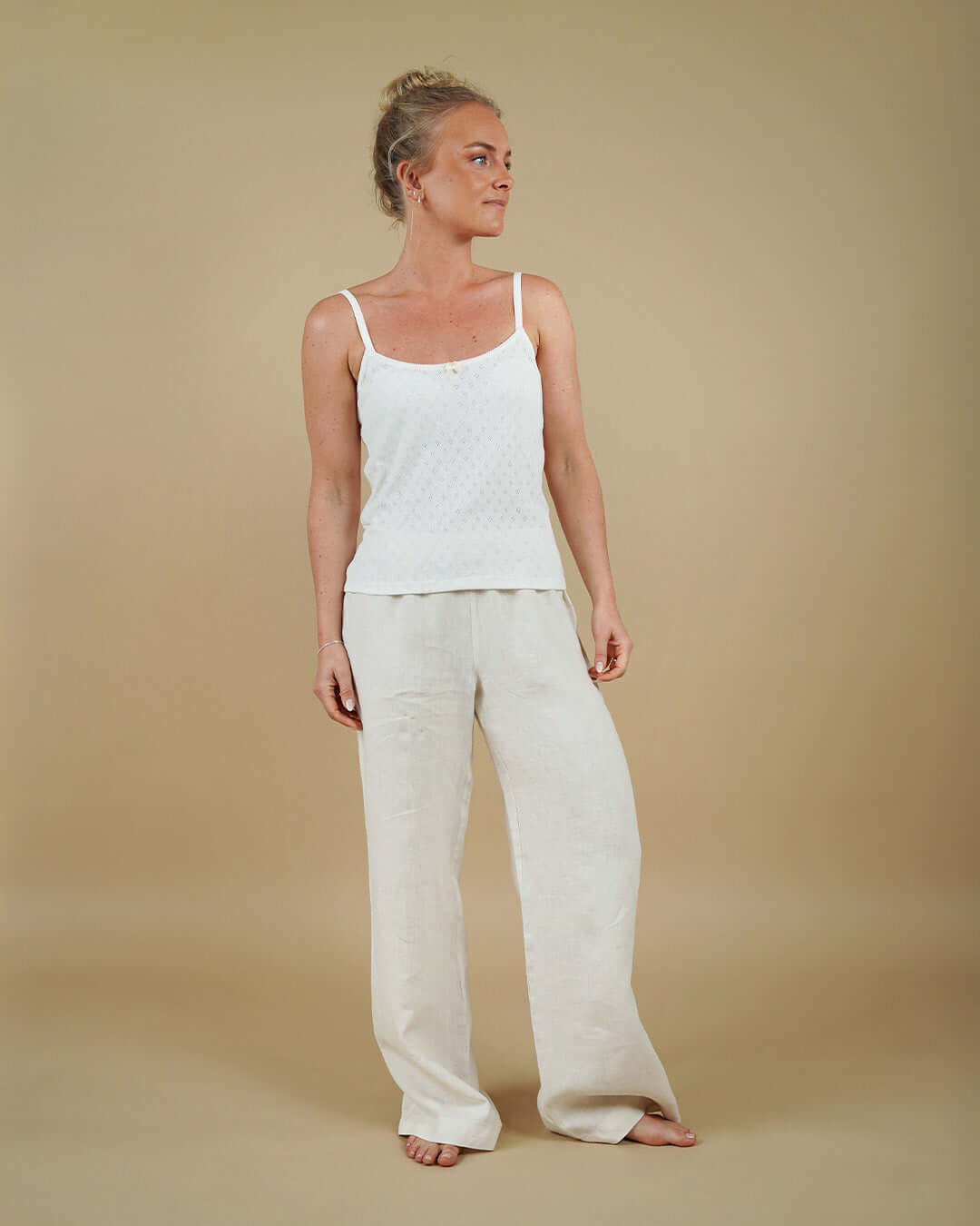 Woman wearing the Camisole Top and High Waist Pants sewing pattern, front view