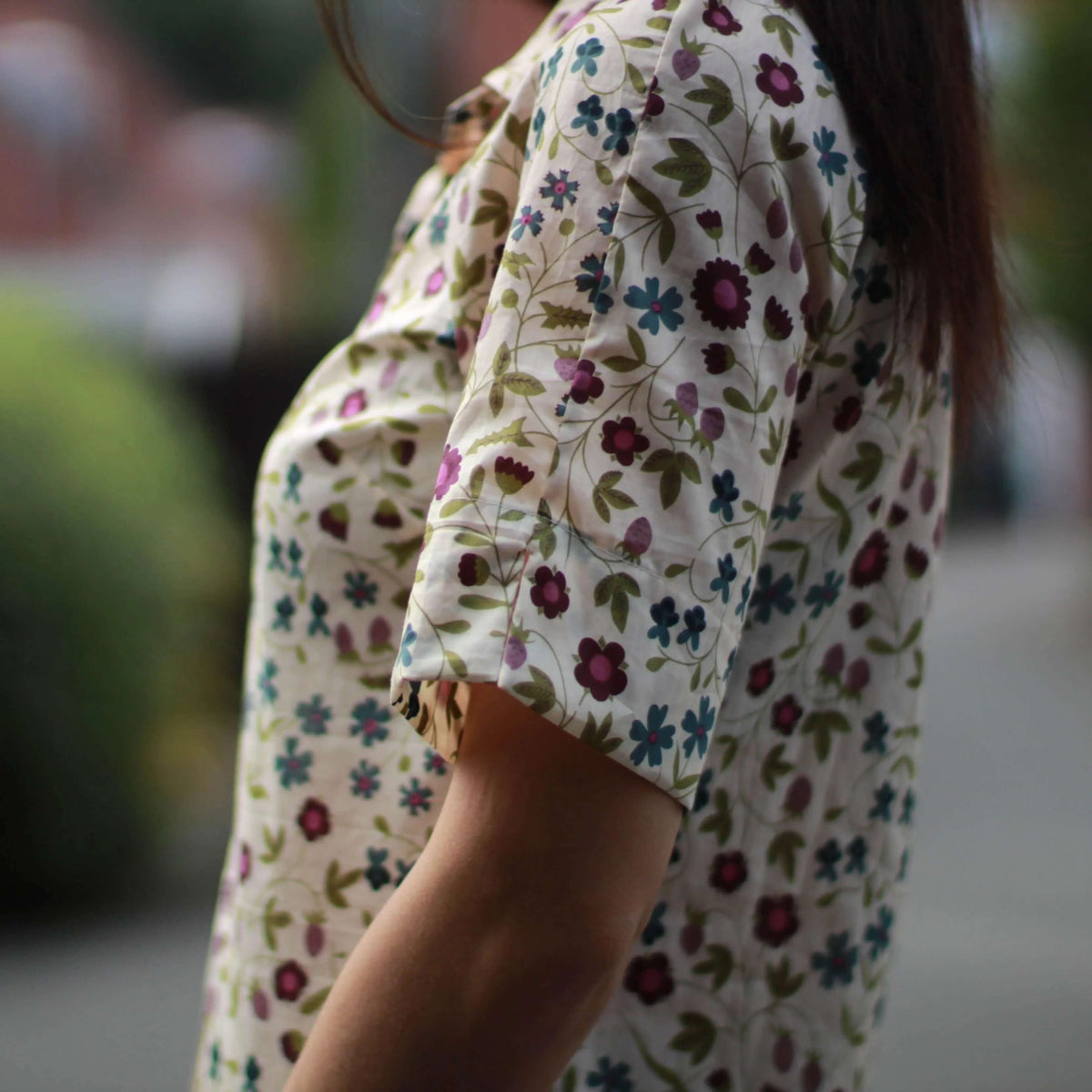 Tropicana shirt Paper Pattern featuring a floral design and 3/4-length raglan sleeves, perfect for summer styling.