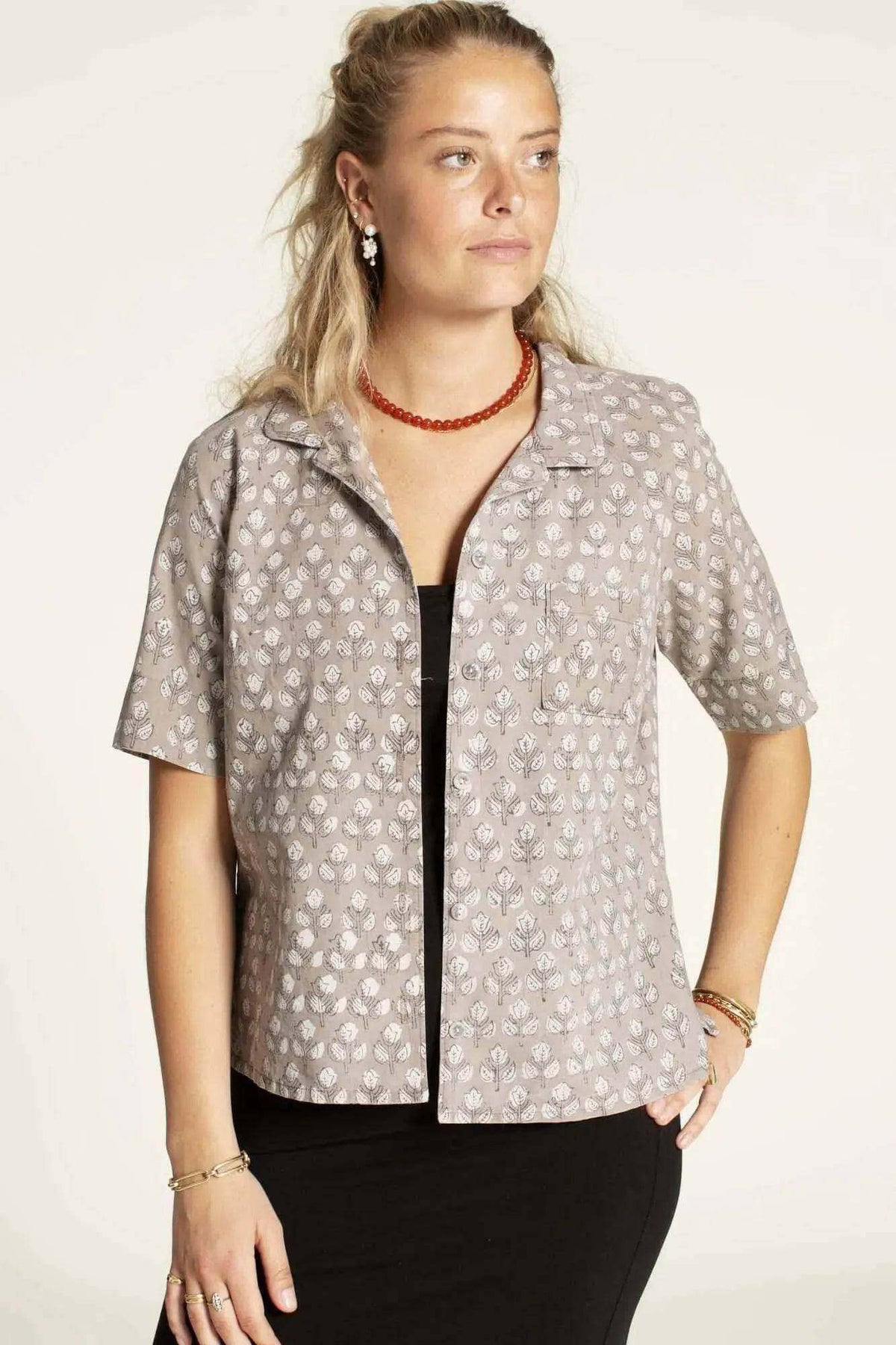 Model wearing the Tropicana Shirt Paper Pattern, showcasing its relaxed fit and 3/4-length sleeves.