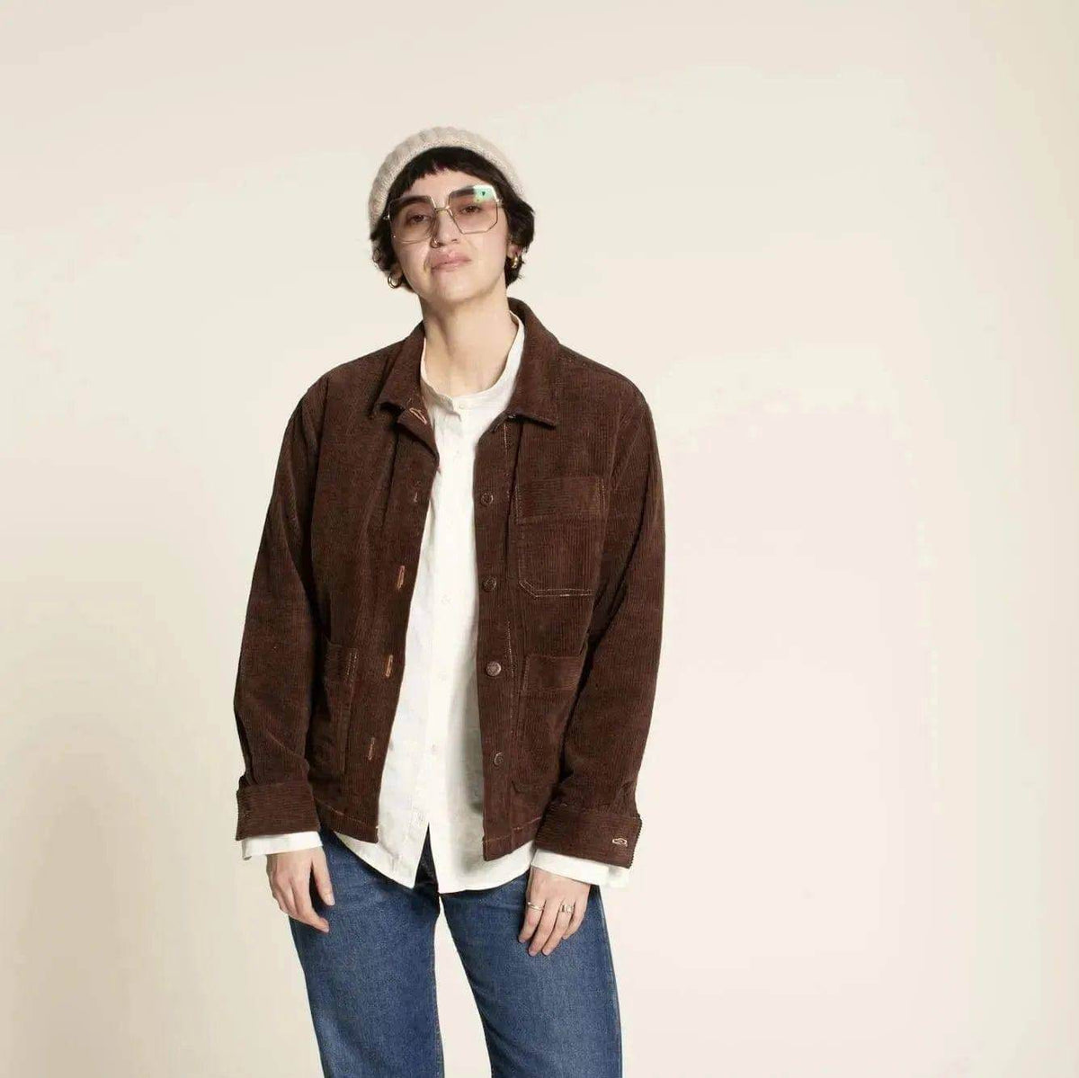 Canvas Jacket Paper Pattern shown in a casual fit with pockets, worn by a woman in a trendy outfit.