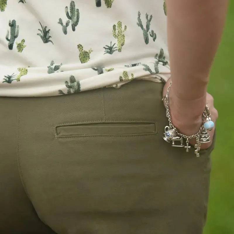 Hepburn Pants Paper Pattern showcased with a fitted design and back welt pocket detail on a model's backside.