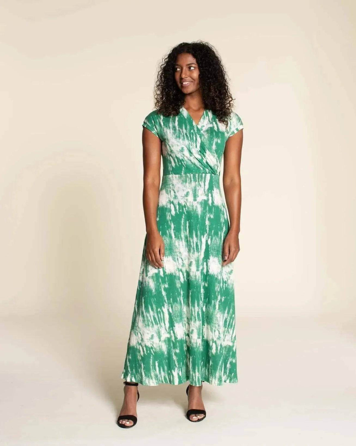 Model wearing a green tie-dye dress from the Mirri Dress Paper Pattern collection.