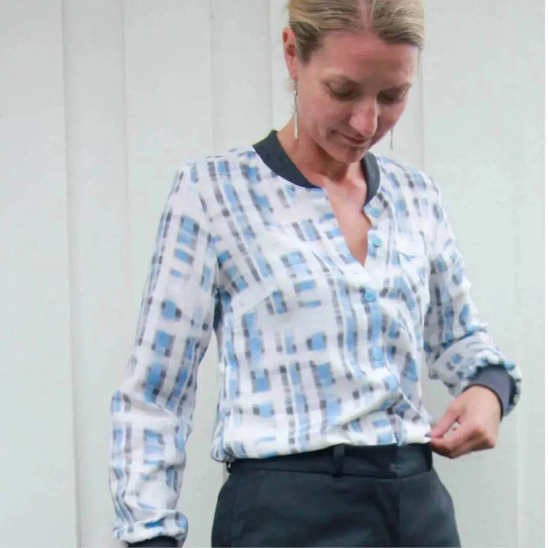 Woman wearing the Savannah shirt Paper Pattern with a modern print and button-up design.