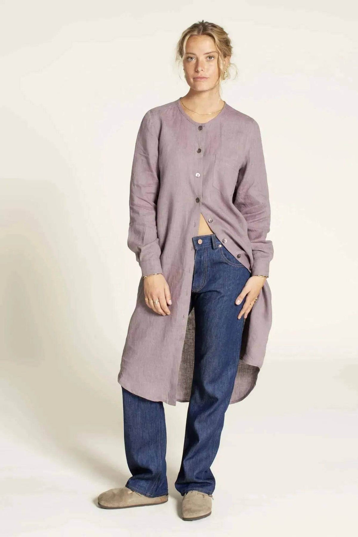 Savannah shirt Paper Pattern worn by a woman, featuring a modern shirt dress style with buttons and casual jeans.