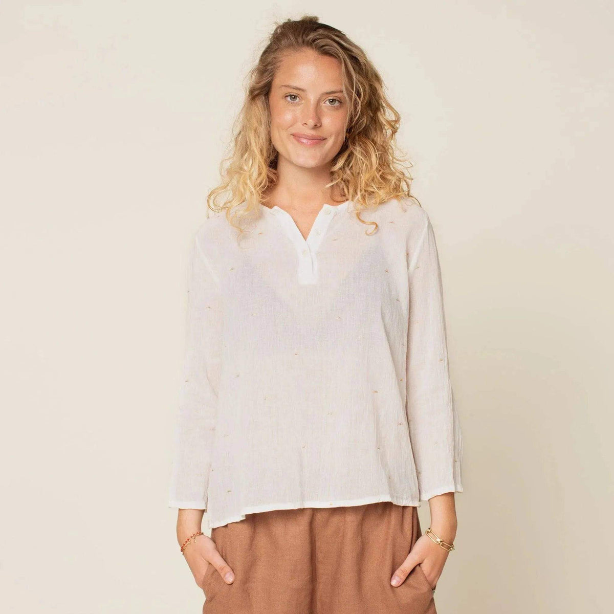 Whisper blouse Paper Pattern worn by a model, featuring a lightweight and breathable design perfect for hot weather.