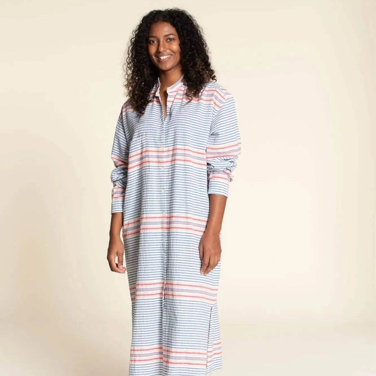 Model wearing a Big Shirt Paper Pattern in striped fabric with a classic collar and relaxed fit.