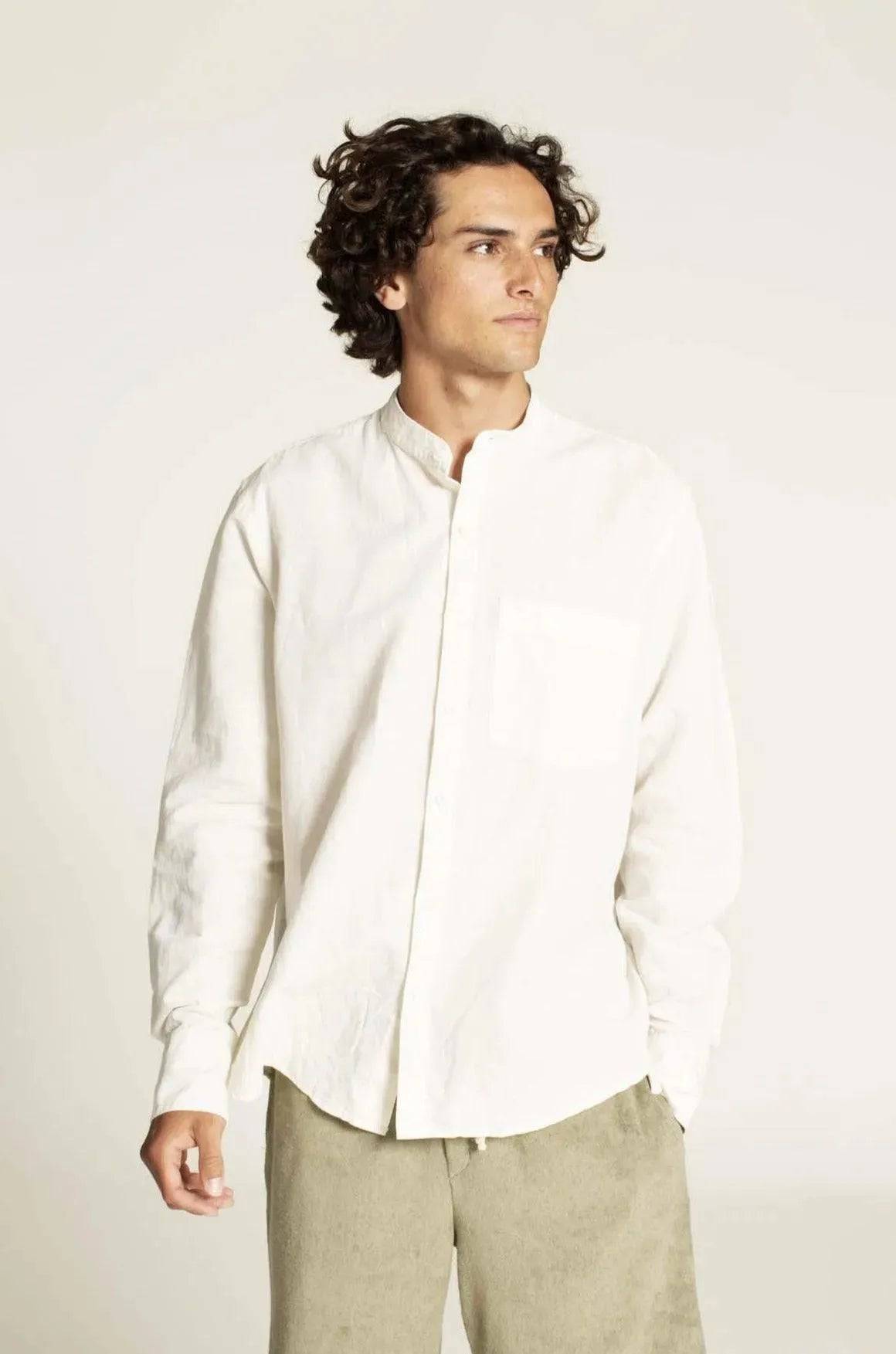 Jensen shirt Paper Pattern in white color on a model, highlighting the button placket and relaxed fit design.