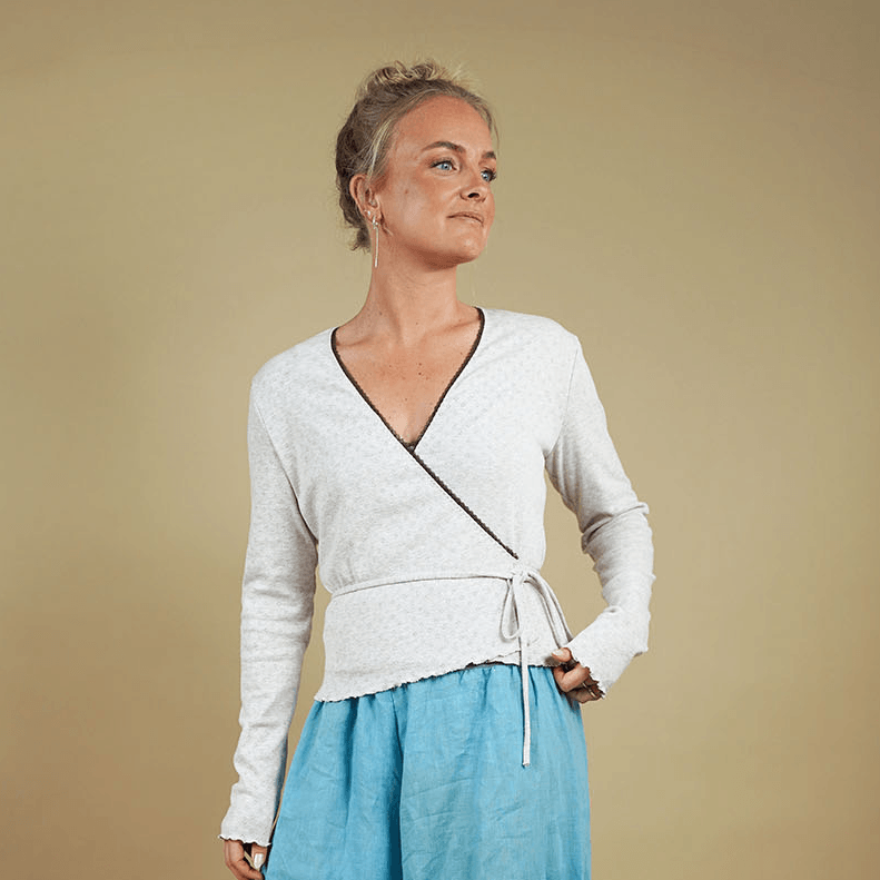 Woman wearing the Wrap Blouse and Bubble Pants sewing pattern, front view